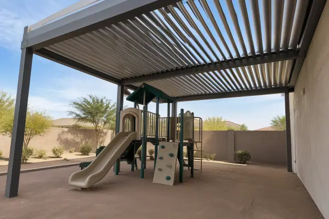 Adjustable louvered roof for a playground shade structure in Gilbert, AZ.