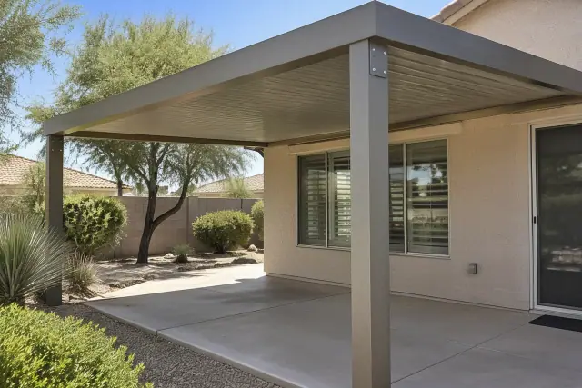 Aluminum ramadas installed at a jobsite with mature desert landscaping in Gilbert, AZ.