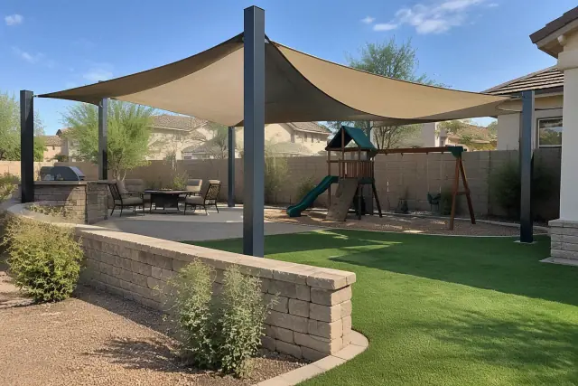 Backyard pergola and patio cover with a curved sail canopy over steel columns in Gilbert, AZ.