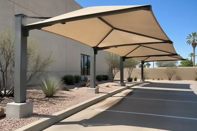 Cantilever and hip shade structures installed over desert gravel in Gilbert, AZ.