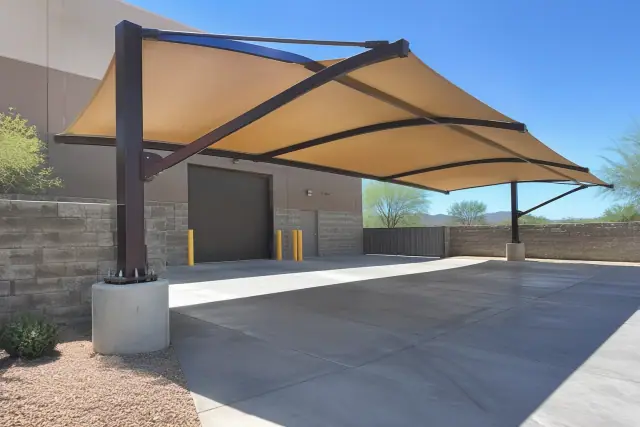 Cantilever shade structure installed over a concrete loading zone in Mesa, AZ.