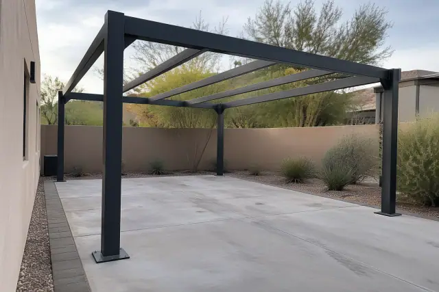 Metal carport frame installation over a paved parking space in Scottsdale, AZ.