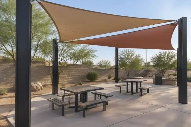 Commercial patio shade cover installation at an outdoor seating pavilion in Gilbert, AZ.