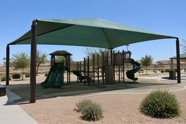 Commercial playground hip shade structure installed at a public park in Gilbert, AZ.