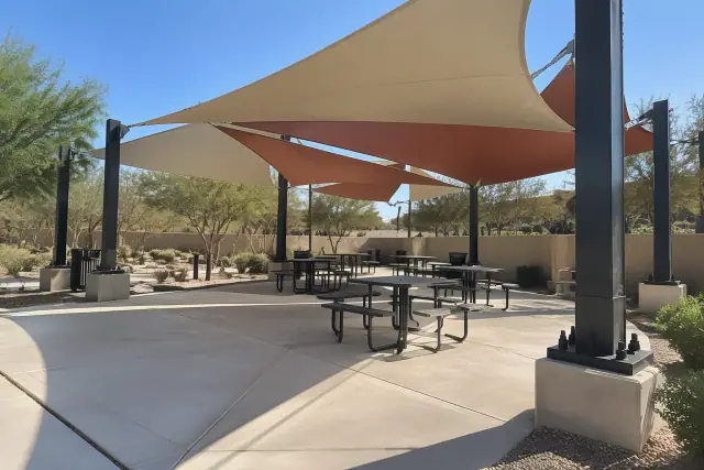 Commercial shade structures installed over an outdoor seating pavilion in Chandler, AZ.