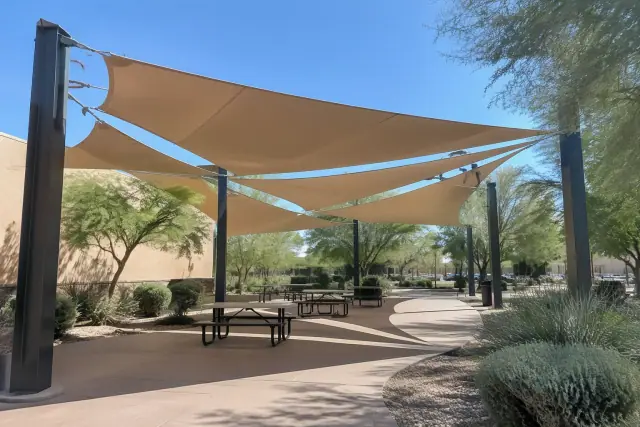 Commercial shade structure installed over an outdoor seating pavilion in Gilbert, AZ.