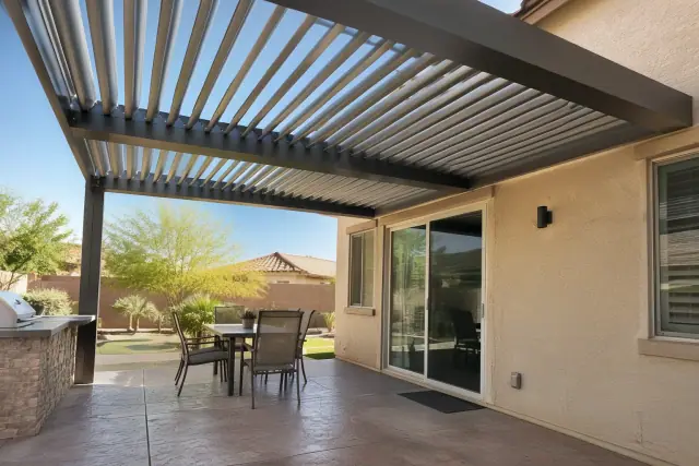 Custom louvered roof installation with aluminum blades on a patio in Gilbert, AZ.