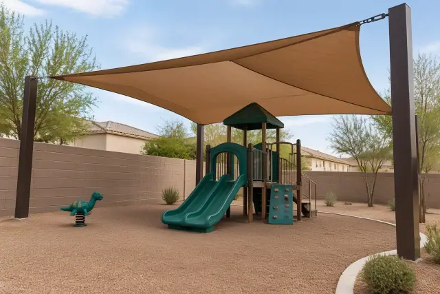 Daycare play area shade structure installed at a residential childcare facility in Gilbert, AZ.