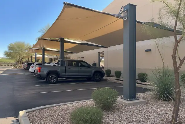 Metal awning shade structures installed at a commercial property in Gilbert, AZ.