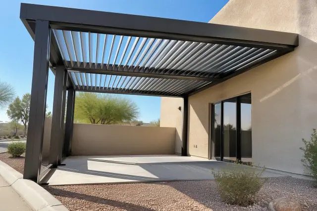 Contractor photo of a louvered roof installation on a commercial stucco building in Gilbert, AZ.