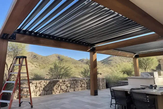 Louvered roof installation on a stone patio in Paradise Valley, AZ.