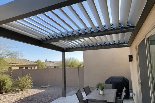 Louvered roof installation on a patio cover in a Gilbert, AZ backyard.