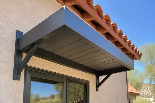 Extruded aluminum canopy bracketed above an entryway in Fountain Hills, AZ.