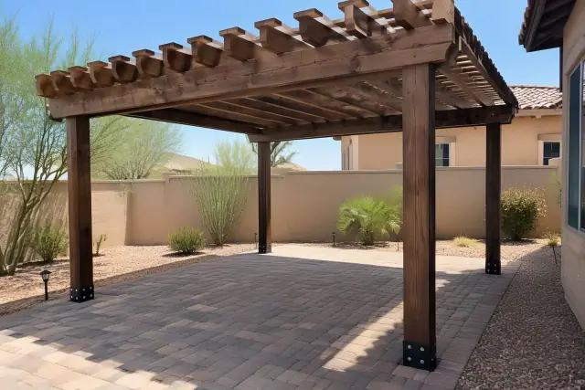 Finished wood pergola installation over a paver stone deck in Scottsdale, AZ.