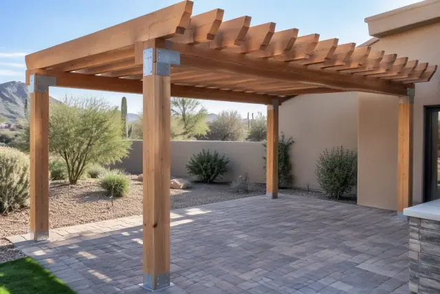Newly installed wood pergola shade structure over a backyard paver deck in Fountain Hills, AZ.