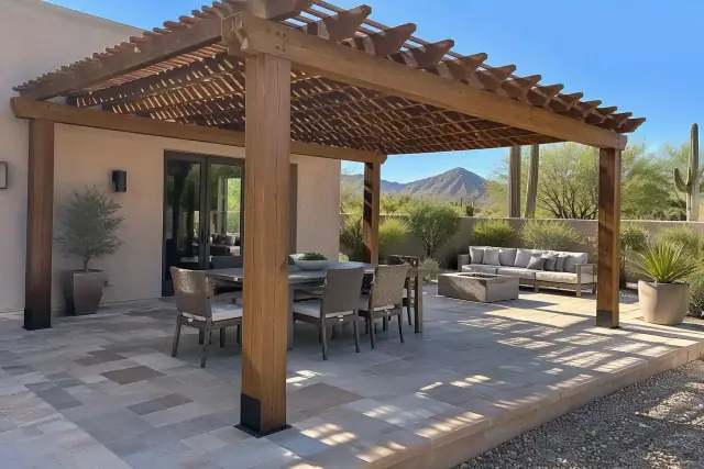 Freestanding wood rafter lattice shade pergola installed over a paver stone deck in Paradise Valley, AZ.