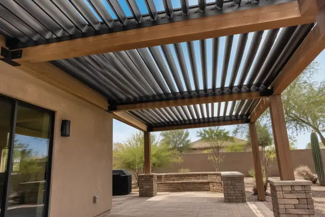 Louvered roof installation in progress on a desert-stone patio in Gilbert, AZ.