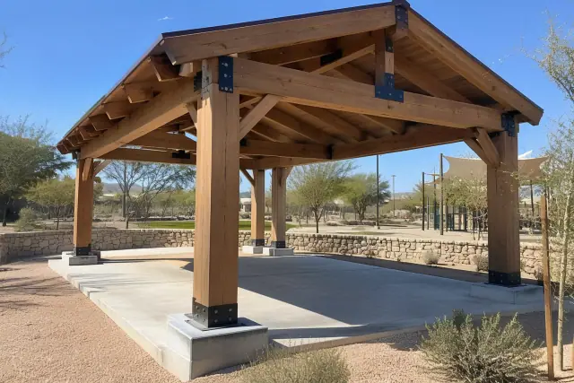 Timber shade structure frame on concrete footings in a Phoenix, AZ residential yard.