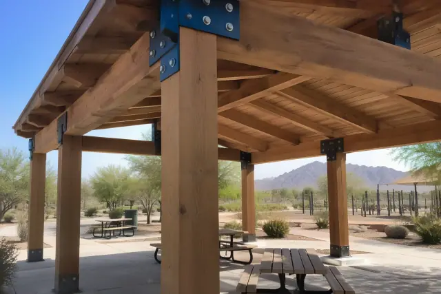 Heavy timber post and beam pavilion frame construction in a public park in Apache Junction, AZ.