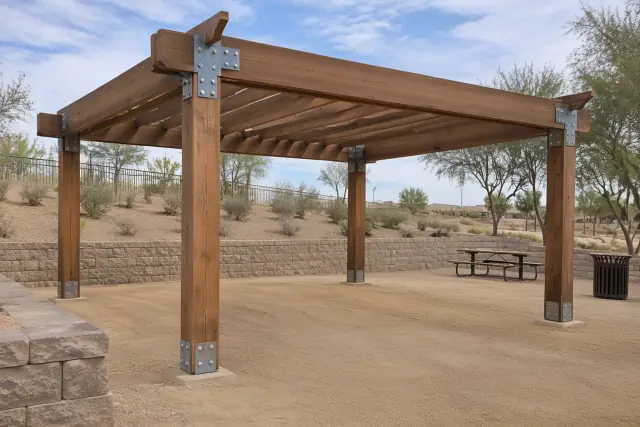 Heavy timber post and beam shade structure under construction in a Queen Creek, AZ park.