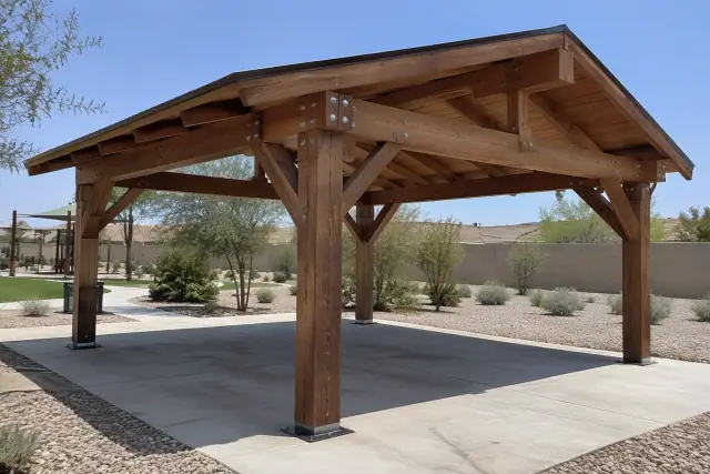 Heavy timber post and beam pavilion frame under construction in a San Tan Valley, AZ public park.