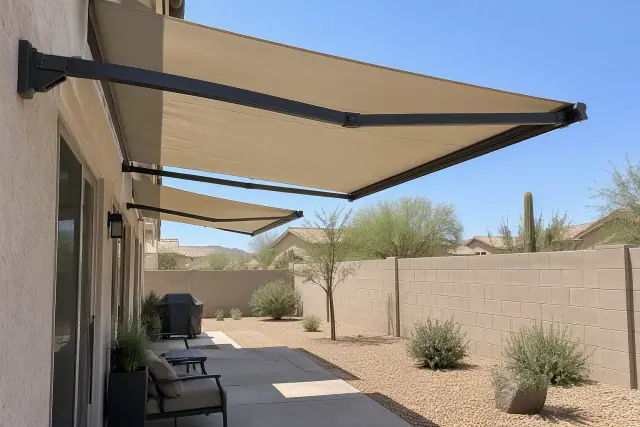 Retractable cantilever canopies extended on a residential block wall in Gilbert, AZ.