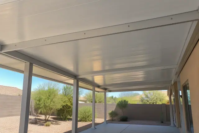 Insulated roof panel assembly on aluminum posts at a home in Gilbert, AZ.