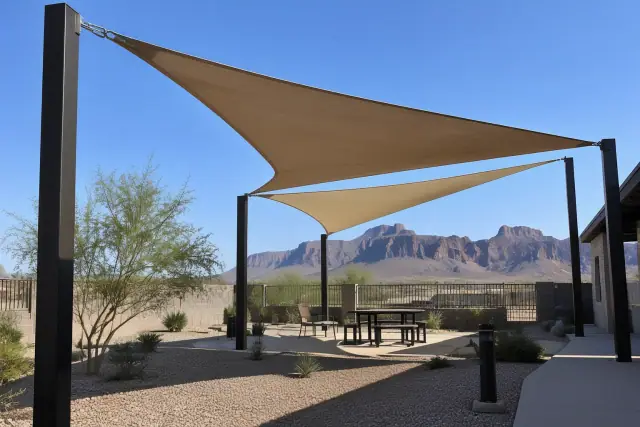 Shade sail installation over a desert courtyard in Apache Junction, AZ.