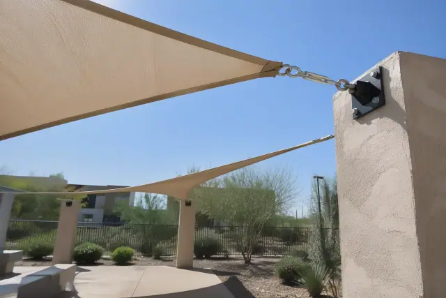Shade sail installation for commercial structures at a public courtyard in Gilbert, AZ.