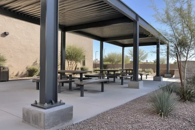 Steel and aluminum commercial shade structure at an outdoor seating pavilion in Gilbert, AZ.