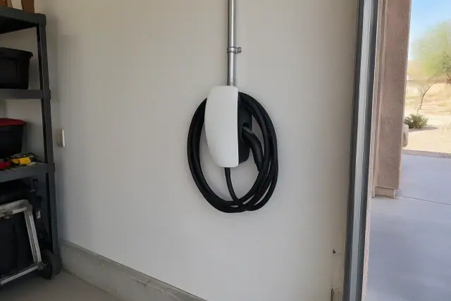 Tesla Wall Connector installation and charger replacement in a residential garage in Mesa, AZ.