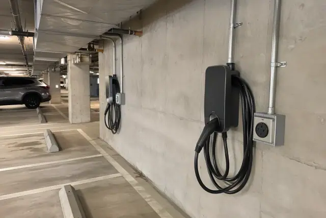 NEMA 14-50 outlet installation with conduit in an underground parking garage in Mesa, AZ.