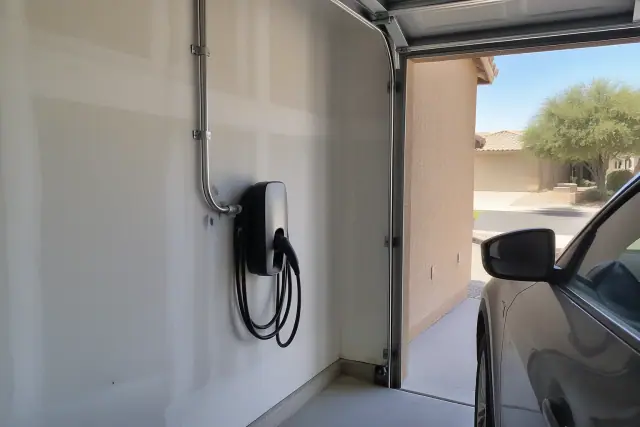 EV charger dedicated circuit installation on an interior wall in Chandler, AZ.