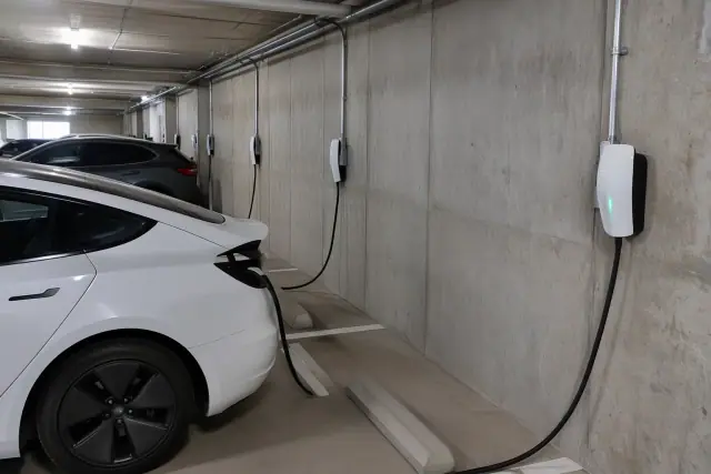 Hardwired Tesla Wall Connectors in an underground parking garage in Mesa, AZ.