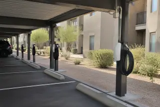 EV charger installation on a stucco exterior wall in Mesa, AZ.