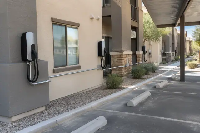 EV charger installation with metal conduit runs across multiple buildings in Mesa, AZ.