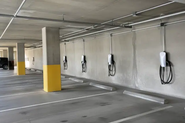 Phased multi-port EV charger installation in an underground parking garage in Mesa, AZ.