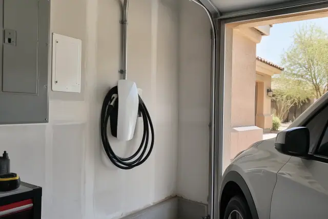 Tesla Wall Connector installation in a residential garage in Scottsdale, AZ.