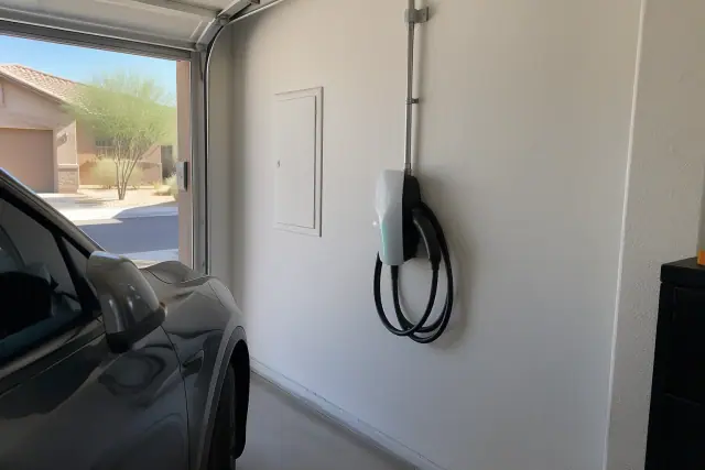 Tesla Wall Connector installation in a residential garage in Chandler, AZ.