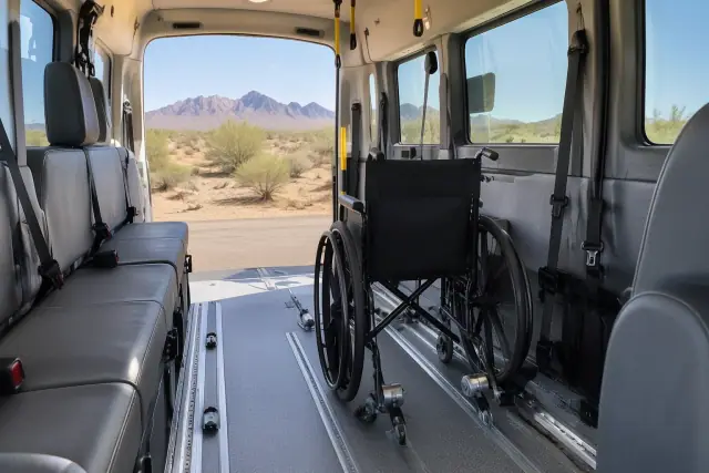 Medical transport van interior with secure floor tracks and desert mountain views in Apache Junction, AZ.