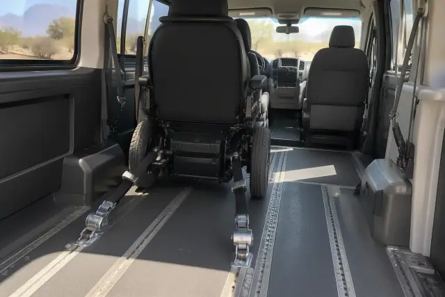 Wheelchair transportation van interior with heavy-duty secure floor tracks in Mesa, AZ.