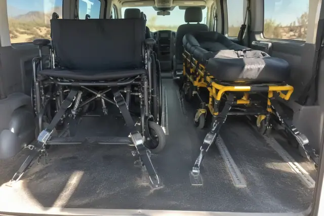 Bariatric wheelchair and stretcher options secured in a transport van in Mesa, AZ.