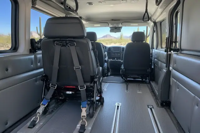 Behavioral health transport van interior with padded walls and floor tracks in Fountain Hills, AZ.