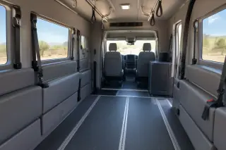 Behavioral health transportation vehicle interior with padded walls in Mesa, AZ.