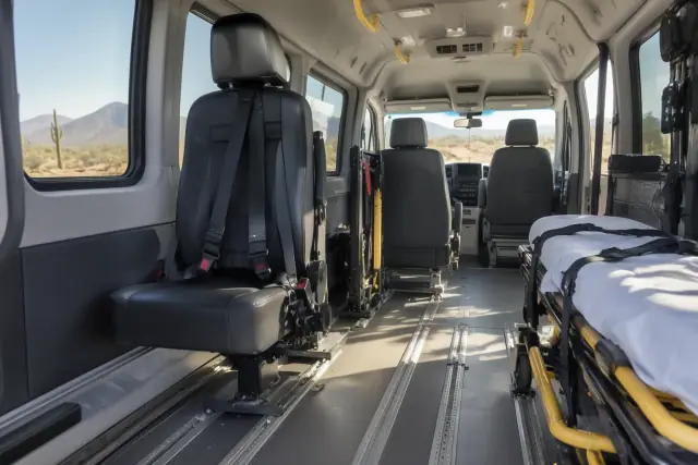Specialized medical transport van interior with secure seating and transfer gear in Mesa, AZ.