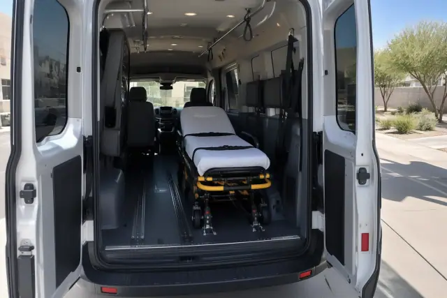 Padded vehicle interior with secure floor tracks for chemotherapy transportation in Mesa, AZ.