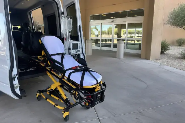 Chemotherapy transportation vehicle at a hospital loading bay in Queen Creek, AZ.