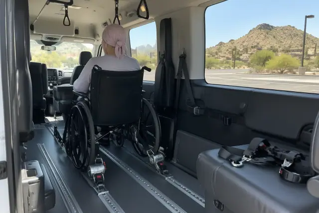 Chemotherapy transportation van interior with securement brackets in Fountain Hills, AZ.