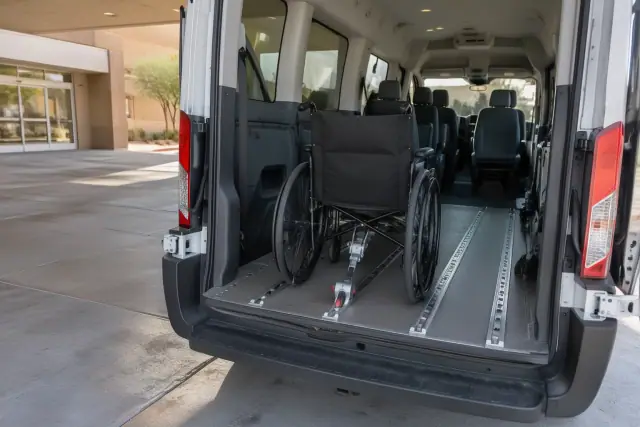 Hospital discharge transportation wheelchair securement anchor in Chandler, AZ.