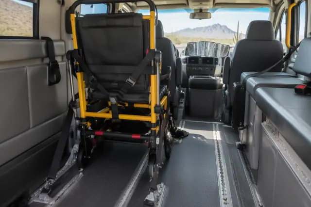 Stair chair transportation secured in a medical transport van in Fountain Hills, AZ.